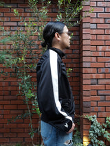 MASU PUMA × MASU T7 CURIO TRACK JACKET エムエーエスユー プーマ T7キュリオトラックジャケット 通販 ブラック 着用イメージ