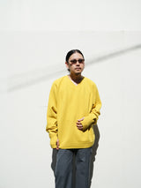 superNova. スーパーノヴァ Whole Garment V-Neck – Super Fine Merino ホールガーメントVネックスーパーファインメリノ 通販 マスタード 着用イメージ